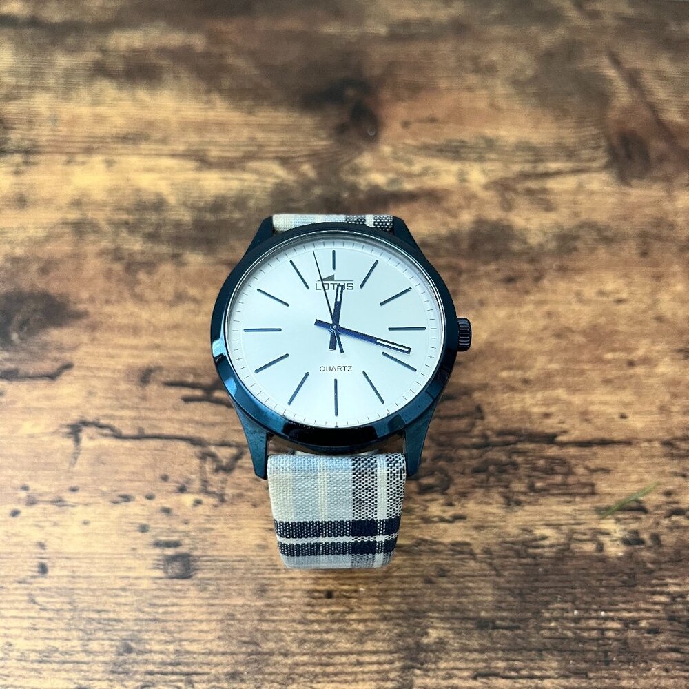 Lotus stainless steel watch with a white dial